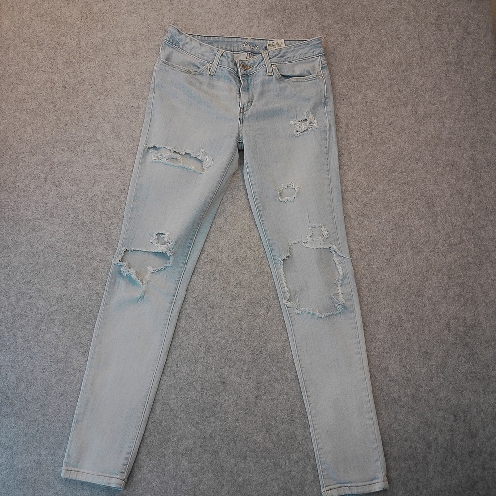 Levis Legging Jeans Womens 27 Light Wash Distressed Shredded Skinny Denim